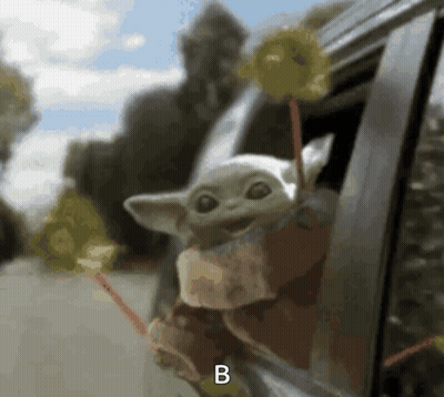 Baby Yoda Holding Lollipop GIF