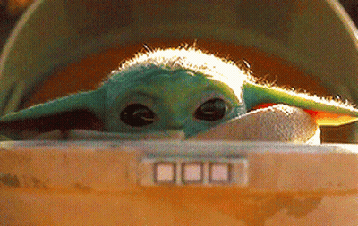 Baby Yoda In A Helmet Close-Up GIF