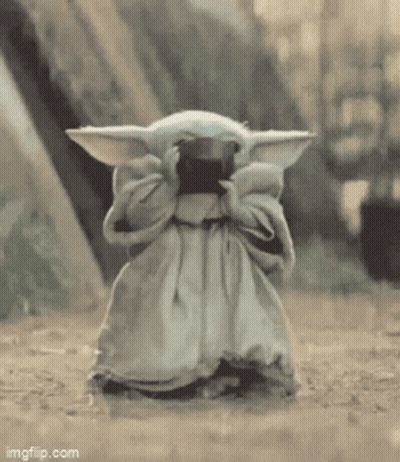 Baby Yoda Standing In Dirt Covering Face GIF