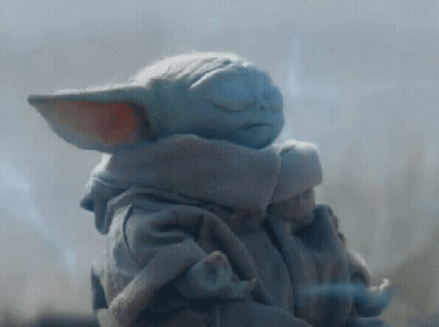 Baby Yoda Statue With Eyes Closed And Scarf GIF