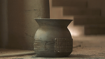 Baby Yoda Sticking Head Out Of Clay Pot GIF