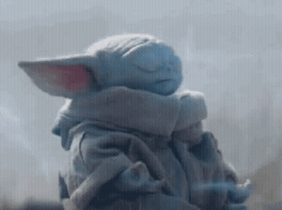 Baby Yoda With Eyes Closed And Scarf GIF