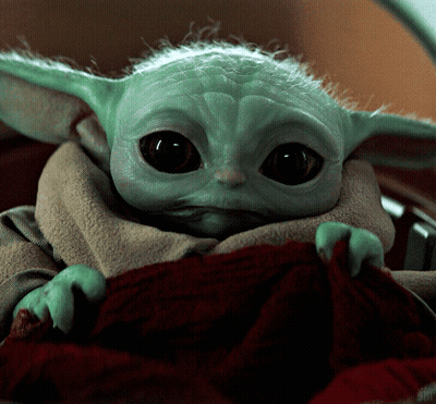 Baby Yoda Wrapped in Brown Blanket