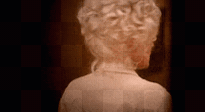Back Of Woman's Head Close Up GIF