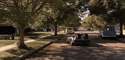 Back To The Future Car Driving Down Street GIF