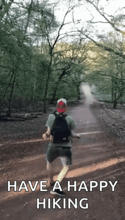 Backpacker On Dirt Path Saying Have Happy Hiking GIF