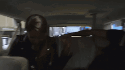 Backseat Woman Headbanging