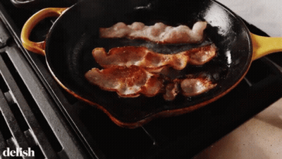 Bacon Cooking In Skillet With Word Delish GIF