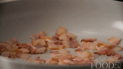 Bacon Is Being Cooked In A Frying Pan And A Circle Says Oh Hi Bacon GIF