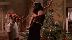 Bad Santa Making The Tree GIF