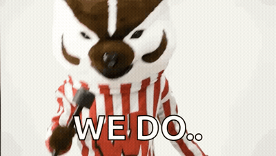 Badger Mascot Holding Microphone Saying We Do GIF