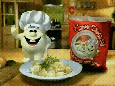 Bag Of Cam Cambly Next To Plate Of Dumplings GIF