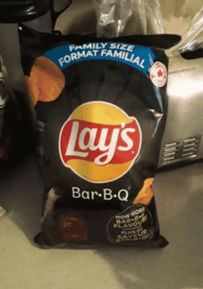 Bag Of Lay's Bar-B-Q Chips On Counter GIF