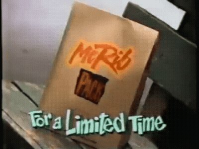 Bag Of Mr. Rib Packs On Wooden Table GIF
