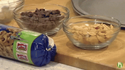 Bag Of Rock N Rolls Beside Bowls Of Food GIF