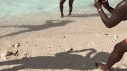 Bahamas Beach Woman Using Fan GIF