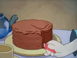 Baker Slicing Chocolate Cake