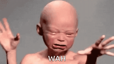 Bald Baby Crying With Funny Face GIF
