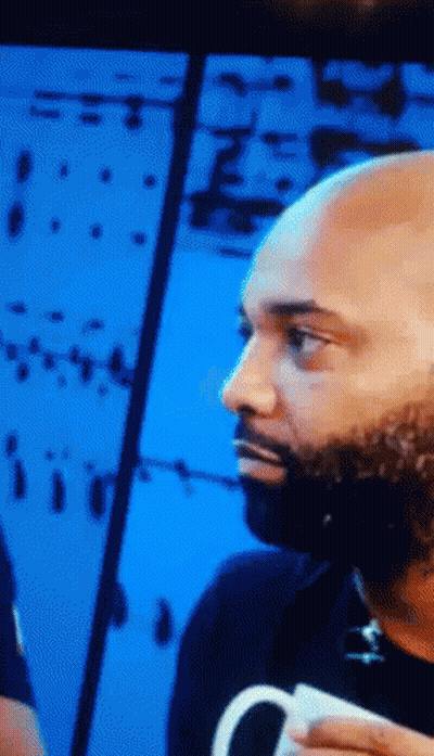 Bald Bearded Man Holding White Cup GIF