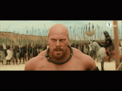Bald Bearded Man In Front Of Soldiers With Letter V GIF