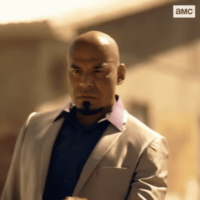 Bald Bearded Man In Suit And Blue Shirt GIF