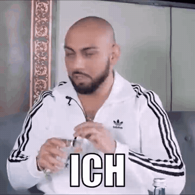 Bald Bearded Man With Glass Of Water GIF