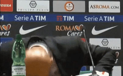 Bald Guy Banging Head On Desk GIF