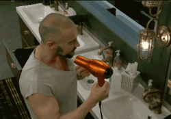 Bald Guy Using Dry Heat Blower GIF