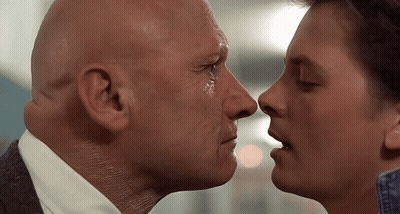 Bald Man And Younger Man Kissing GIF