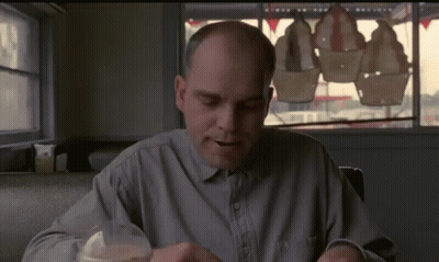 Bald Man At Table GIF