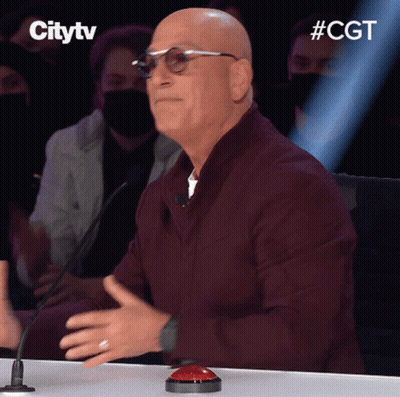 Bald Man At Table With Red Button Citytv GIF