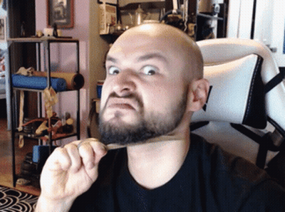 Bald Man Brushing Beard With Bamboo Brush GIF