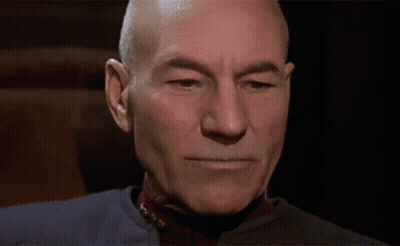Bald Man Close Up Dark Background GIF