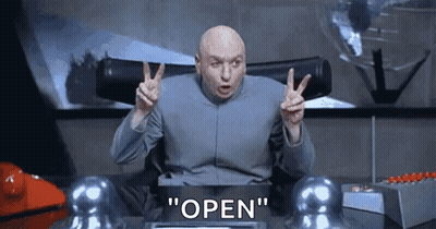 Bald Man Giving Peace Sign Saying Open GIF