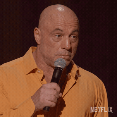 Bald Man Holding Microphone Netflix Logo GIF