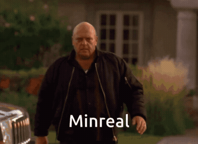 Bald Man In Black Jacket With Minreal GIF