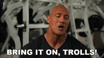 Bald Man In Black Shirt Says Bring It On Trolls GIF