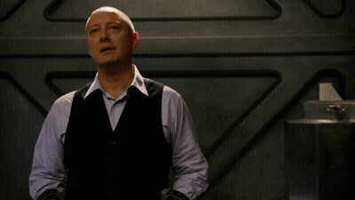 Bald Man In Black Vest And Blue Shirt GIF