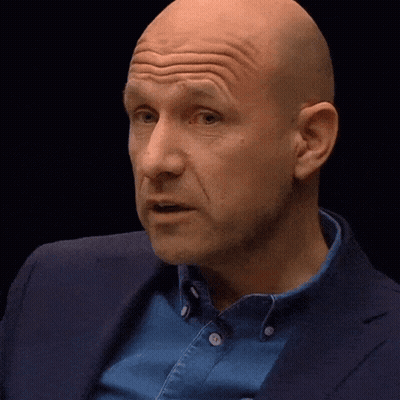 Bald Man In Blue Shirt And Blue Jacket GIF