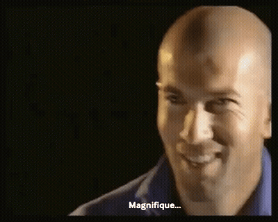 Bald Man In Blue Shirt Smiling And Talking GIF
