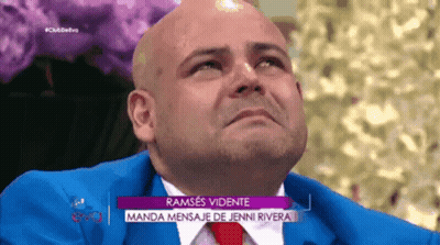 Bald Man In Blue Suit And Red Tie On TV Show GIF