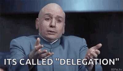 Bald Man In Blue Suit Making Funny Face Saying Its Called Delegation GIF