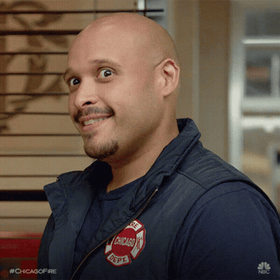 Bald Man In Chicago Fire Department Vest Smiling GIF