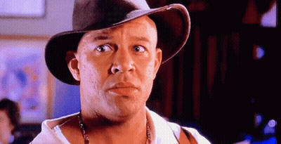 Bald Man In Cowboy Hat And Necklace GIF