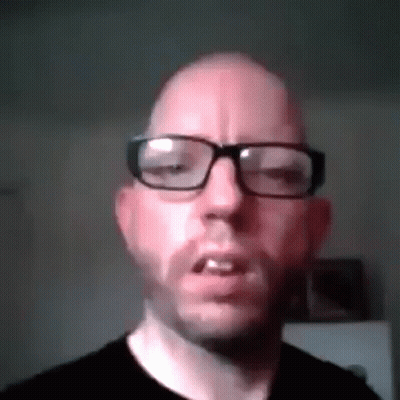 Bald Man In Glasses And Black Shirt GIF