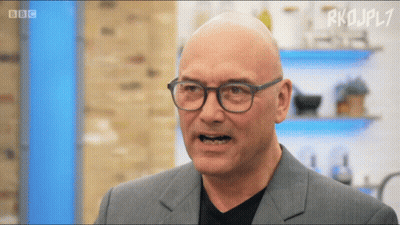 Bald Man In Glasses And Suit On BBC TV Show GIF
