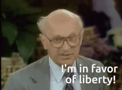 Bald Man In Glasses And Suit Says I'm In Favor Of Liberty GIF