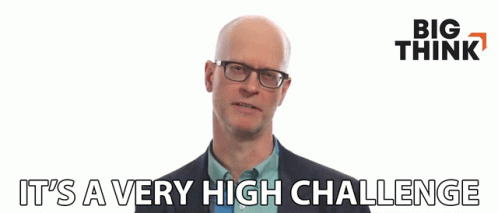 Bald Man In Glasses And Suit Says It's A Very High Challenge GIF