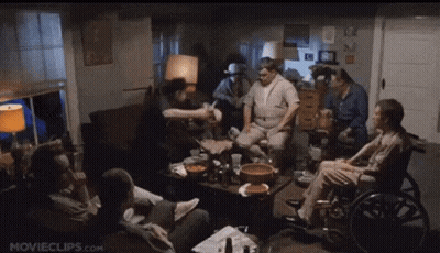Bald Man In Gray Shirt At Window GIF