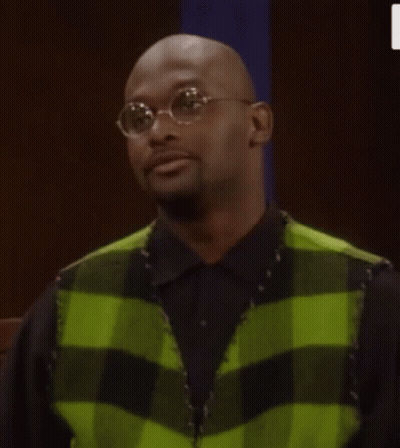 Bald Man In Green And Black Plaid Vest GIF
